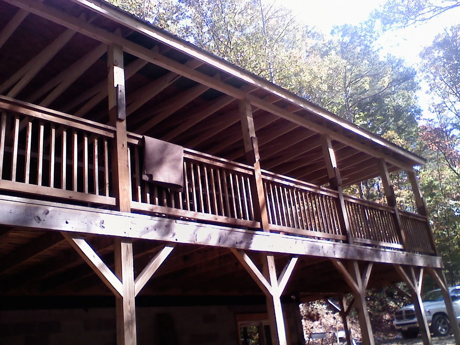 Timber framing under a new elevated porch and deck — Roof Leak Repair in Lock Haven by Roofing Brothers